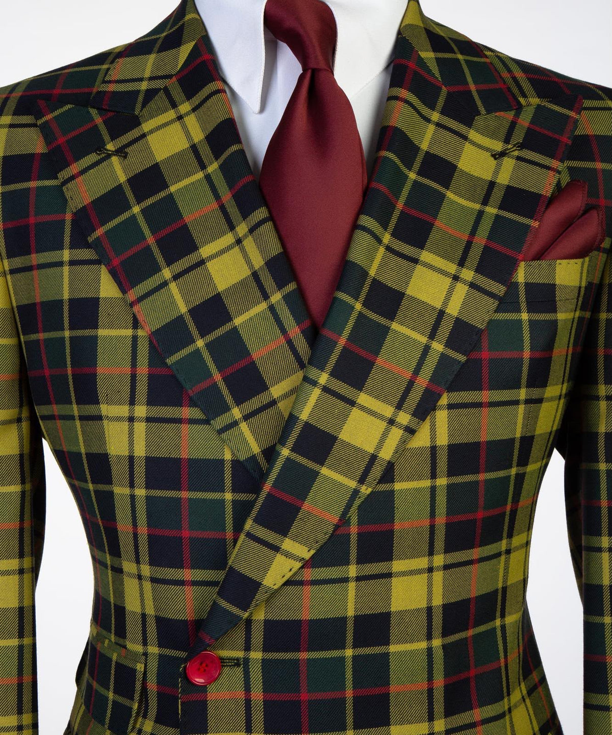 Jaegen tartan wide peak lapel and red button detail